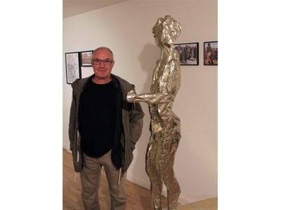 Artist With Statue